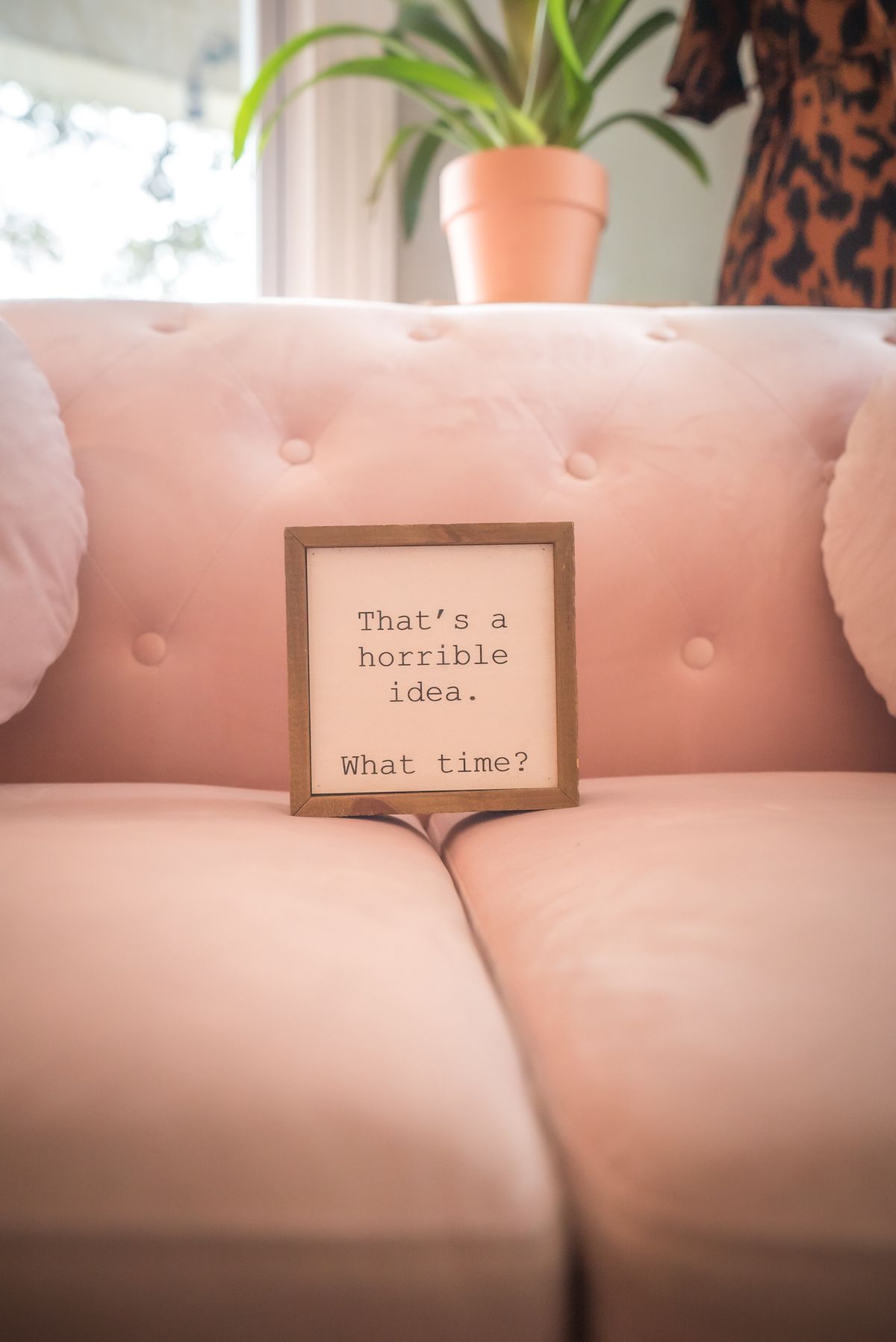 A playful sign in the Opal Aesthetics & Wellness lobby in Dripping Springs, Texas