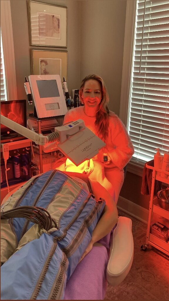 Priscilla receiving Ballancer Pro lymphatic massage with LED light therapy at Opal Aesthetics & Wellness