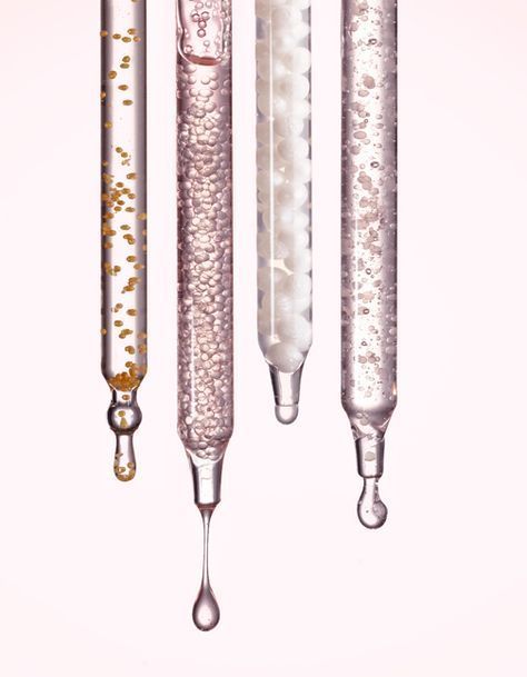 Serum droppers representing the clinical-grade skincare used at Opal Aesthetics & Wellness