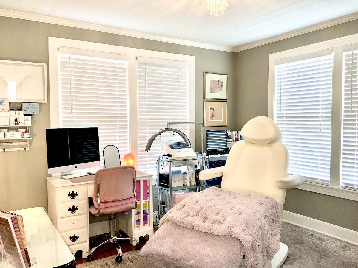 Med spa treatment room with facial equipment at Opal Aesthetics & Wellness